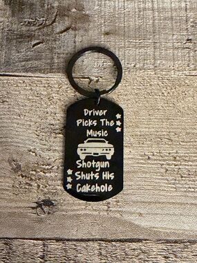 Black Metal Keychain with White Car Graphic and Text
